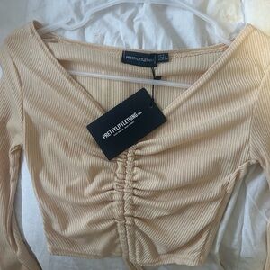 Pretty little thing tie top!